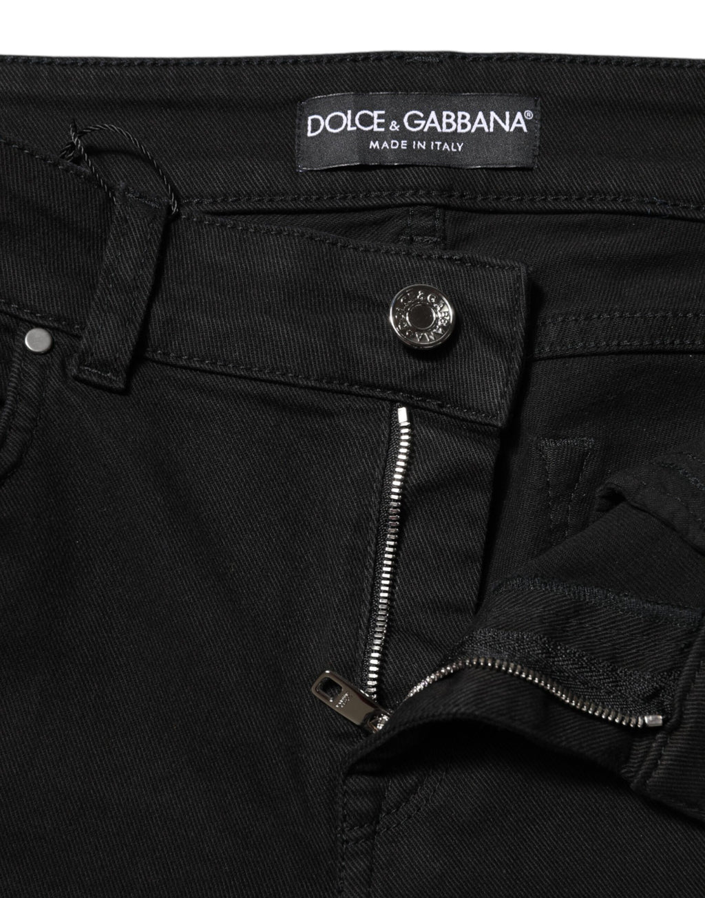 Jeans slim en coton noir de Dolce & Gabbana, coupe skinny, taille mi-haute, denim, avec détails classiques.