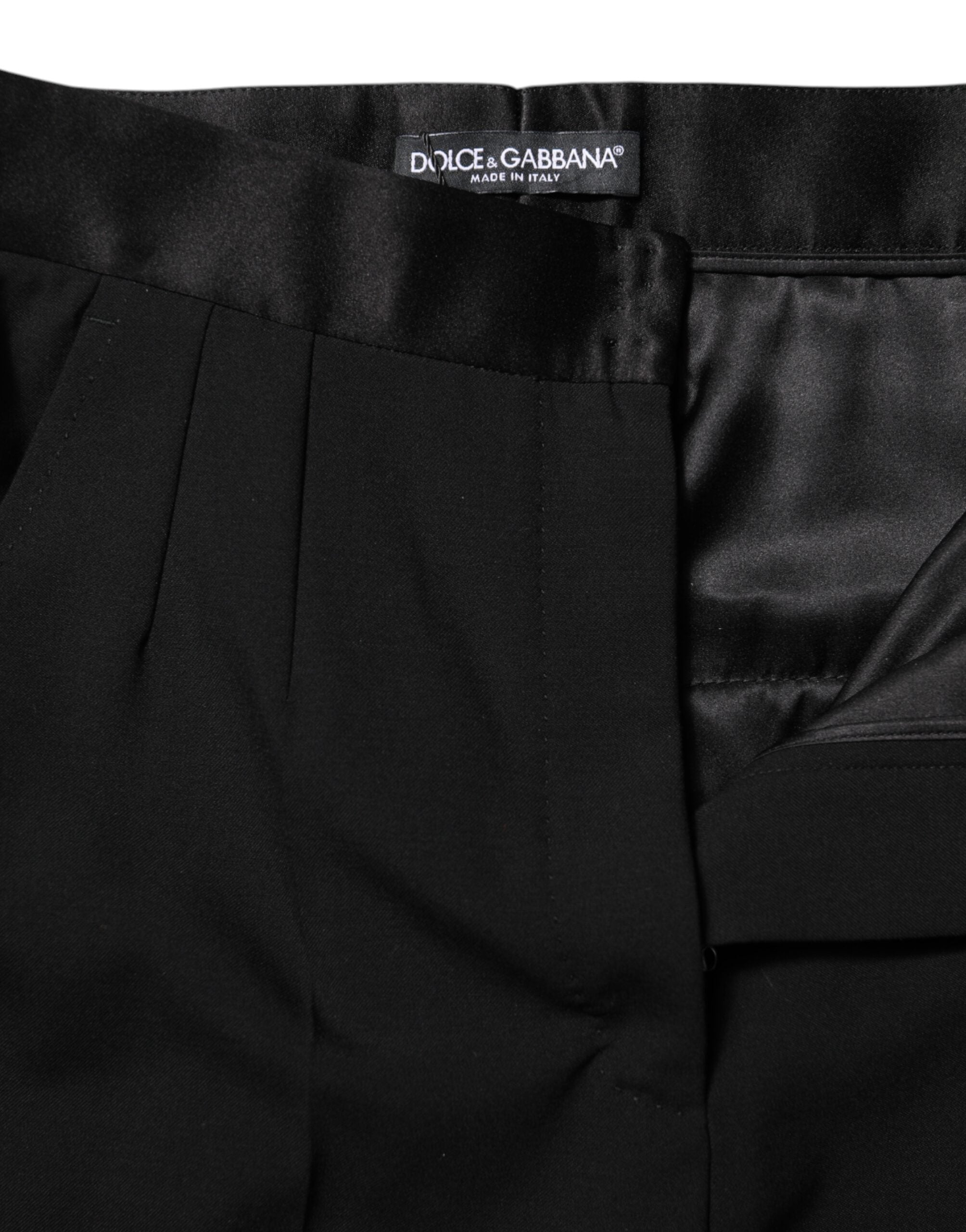 Pantalons noirs en laine Dolce & Gabbana, coupe tapered taille haute, vue de face sur fond blanc.