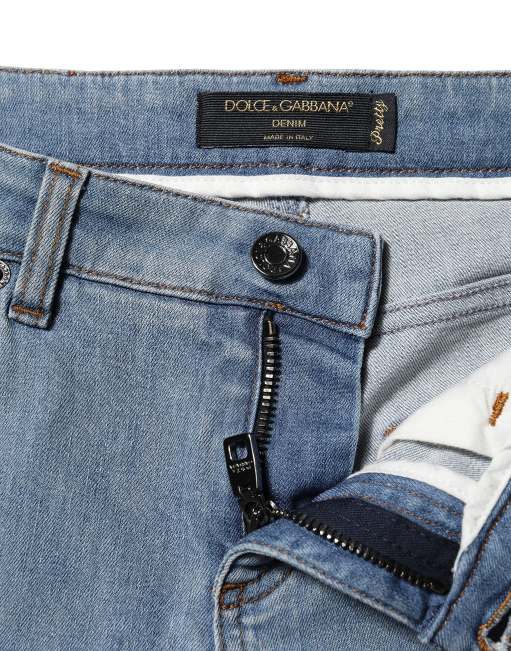Jeans skinny en denim bleu Dolce & Gabbana, taille moyenne, coupe ajustée, en coton.