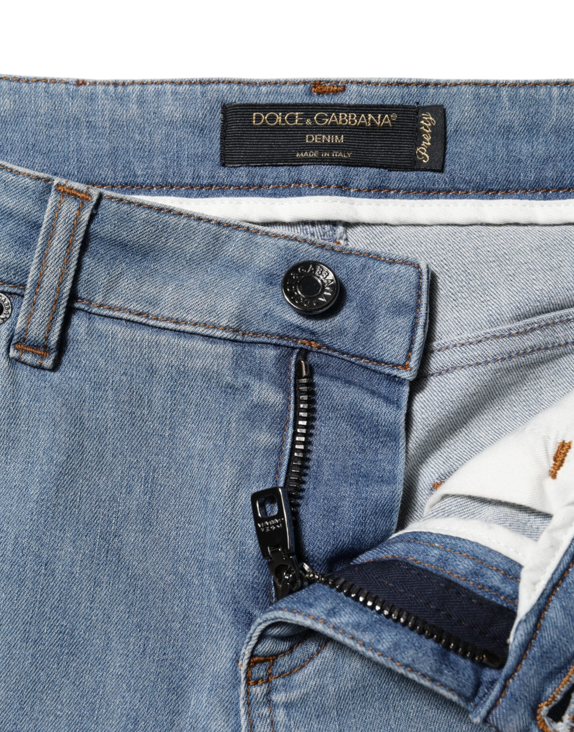 Jeans skinny en denim bleu Dolce & Gabbana, taille moyenne, coupe ajustée, en coton.