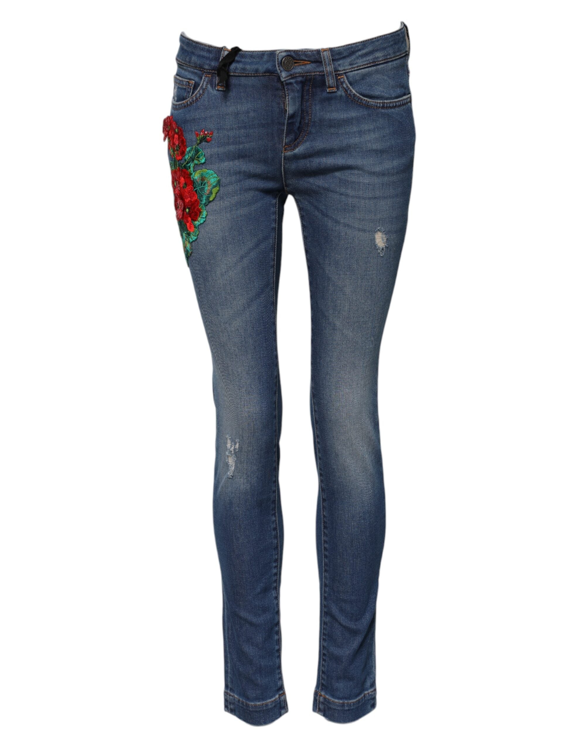 Jeans skinny en coton bleu à taille basse de Dolce & Gabbana, coupe ajustée, détails classiques en denim.