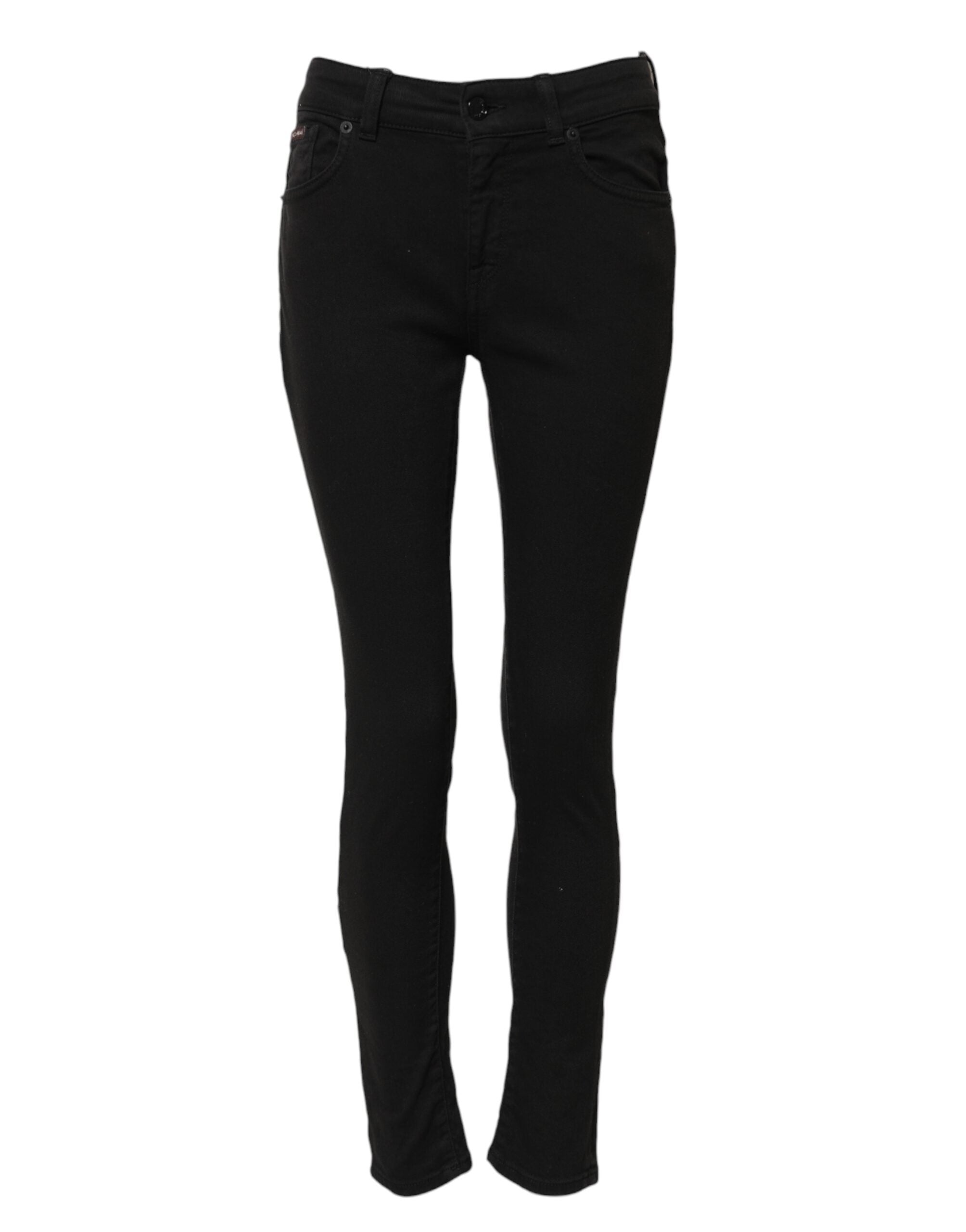 Jeans skinny en coton noir Dolce & Gabbana, taille mi-haute, coupe ajustée et moderne, visible sur le modèle.