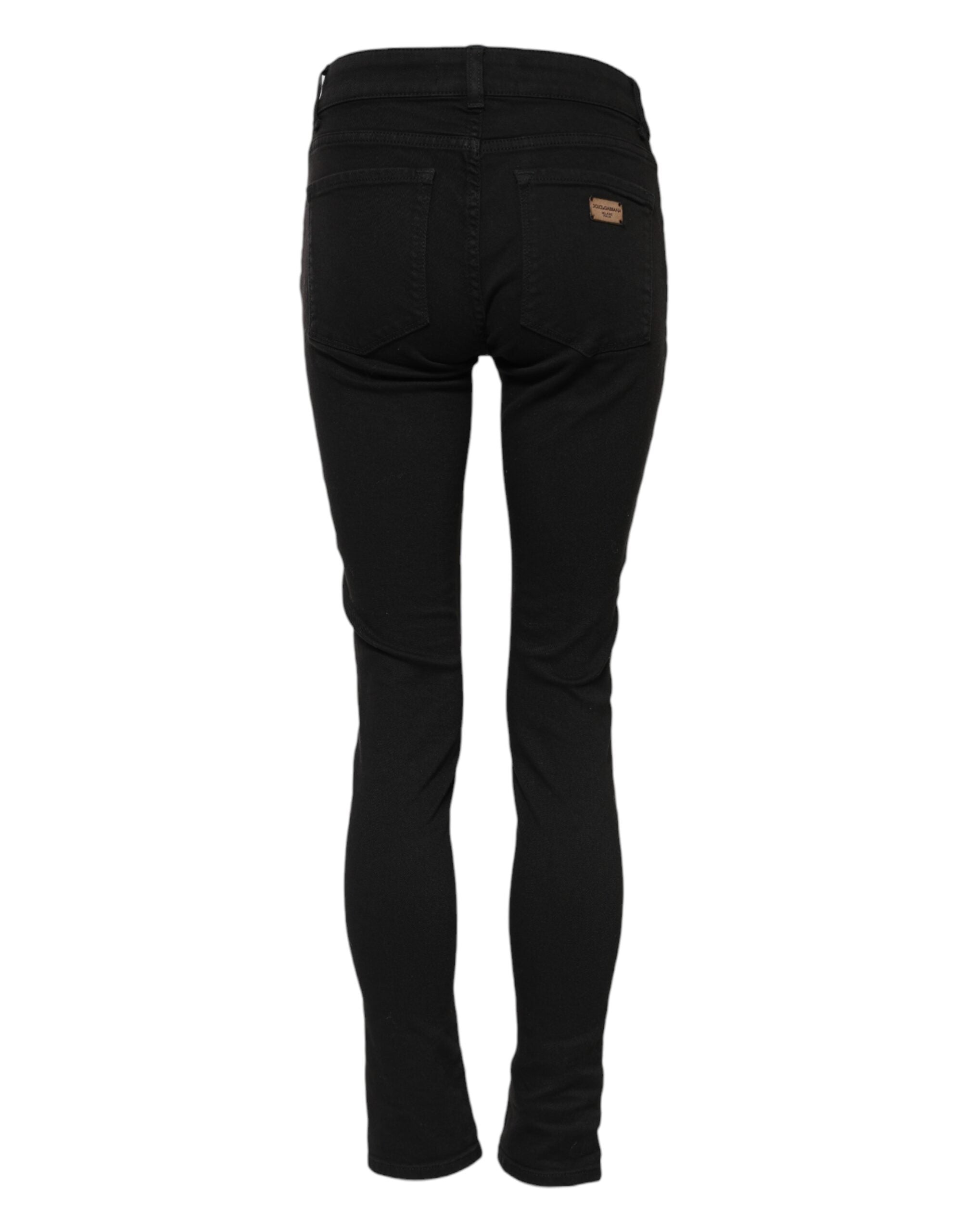 Jeans skinny en coton noir Dolce & Gabbana, taille mi-haute, coupe ajustée, visible en détail sur l'image.
