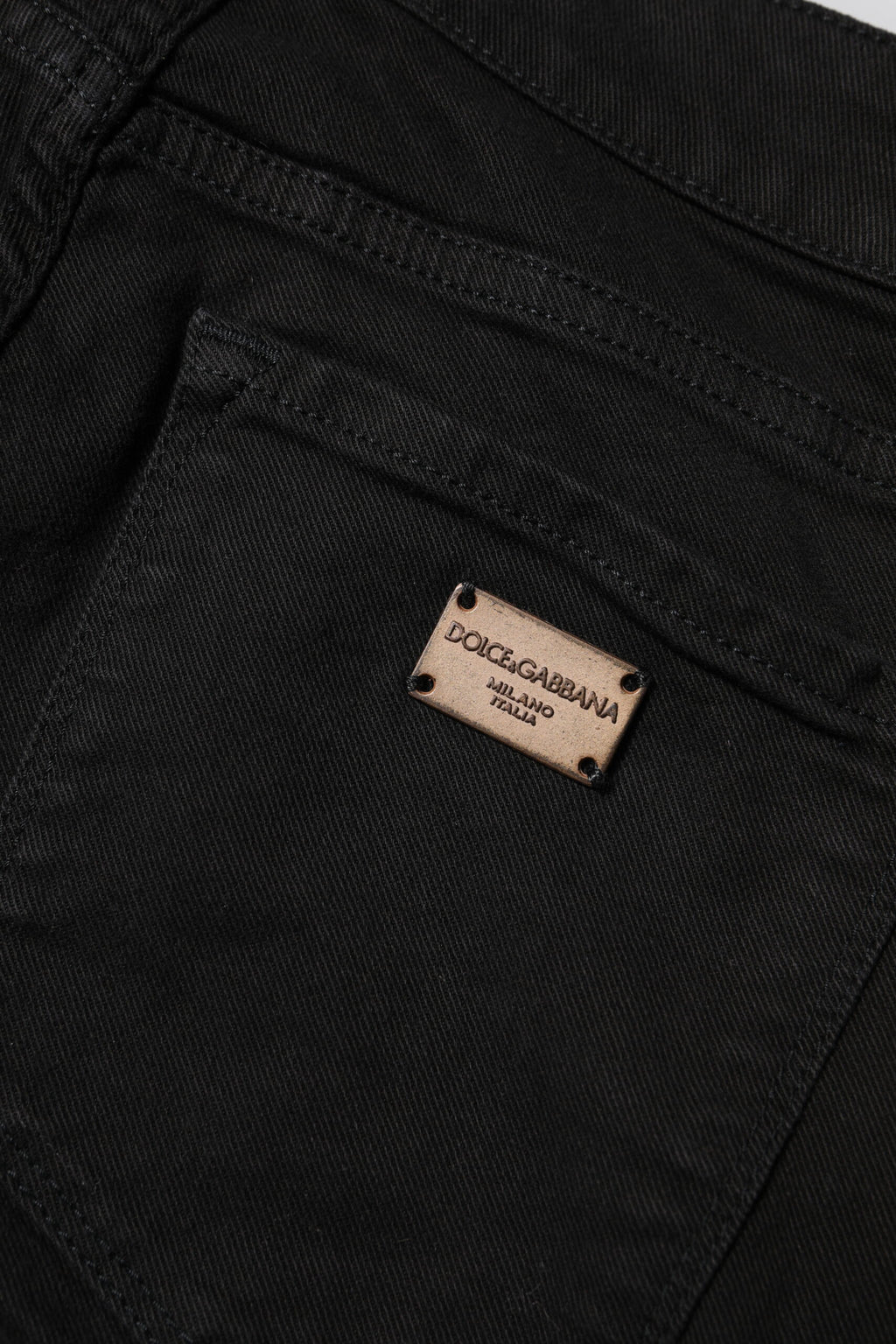 Jean skinny noir en coton Dolce & Gabbana, coupe mi-haute, denim élégant avec détails modernes.