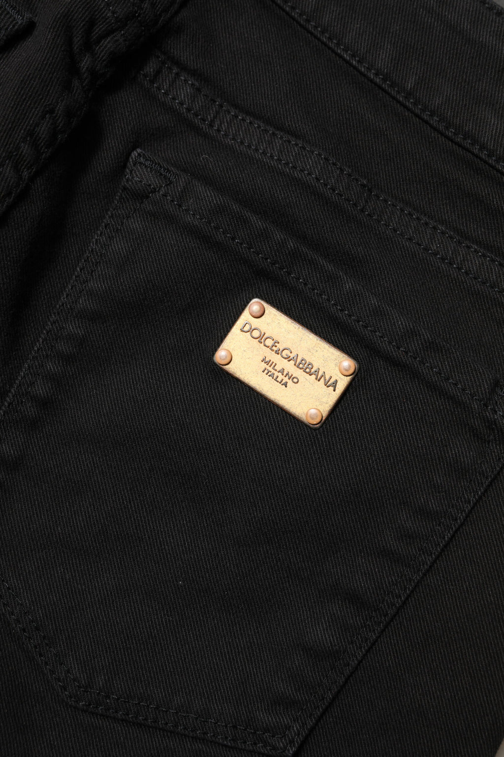 Jean skinny en coton noir Dolce & Gabbana, taille mi-haute, coupe ajustée, visible détails du denim sur le produit.