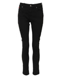 Jeans slim en coton noir Dolce & Gabbana avec logo, taille mi-haute, finition denim, visible sur une silhouette.