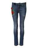 Jeans skinny en denim bleu à taille basse de Dolce & Gabbana, coton, coupe ajustée et tendance, visible sur l’image.