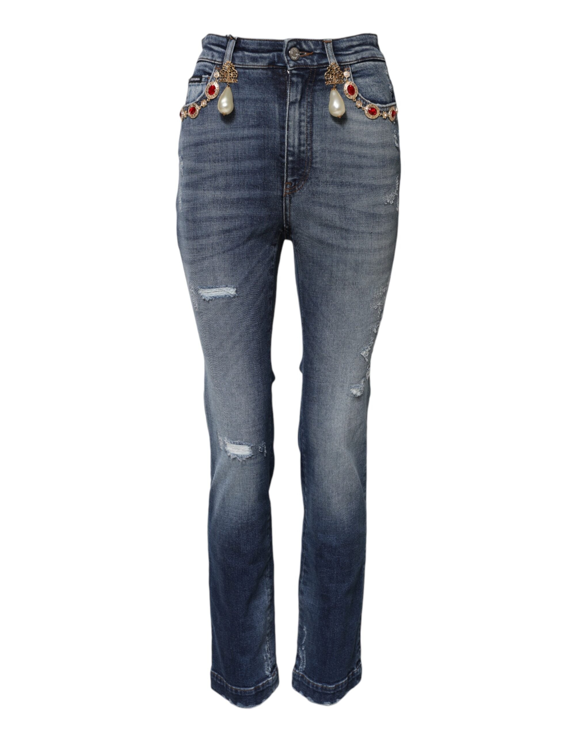 Jeans en denim bleu Dolce & Gabbana ornés de strass et paillettes, mode élégante et chic, visible en gros plan.