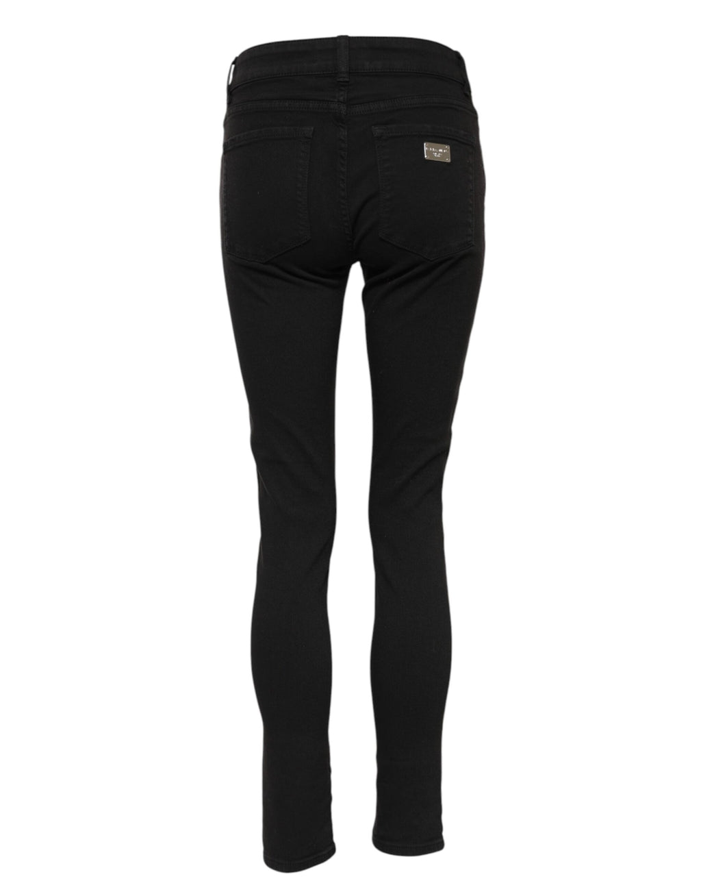 Jeans skinny en coton noir Dolce & Gabbana avec logo, taille mi-haute et coupe ajustée, visible sur l'image.
