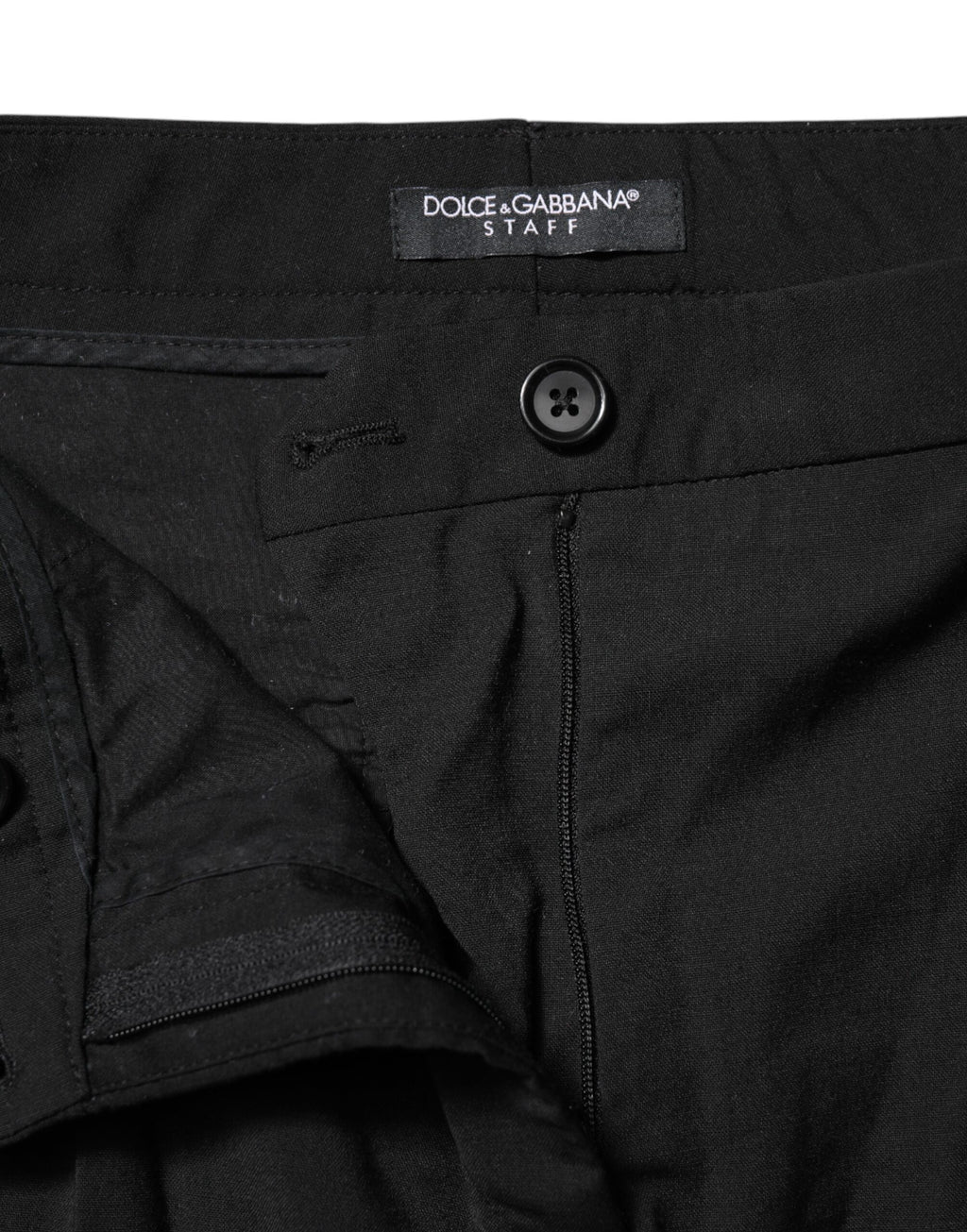 Pantalon noir Dolce & Gabbana STAFF à taille moyenne et coupe tapered, vue de face.