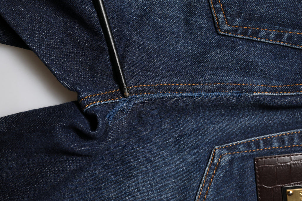 Jeans skinny en denim bleu à taille haute Dolce & Gabbana GRACE, vue de face, détails modernes et coupe ajustée.