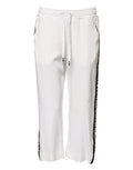 Pantalon jogger blanc en viscose de Dolce & Gabbana, pantalon décontracté avec ceinture élastique et poches latérales.