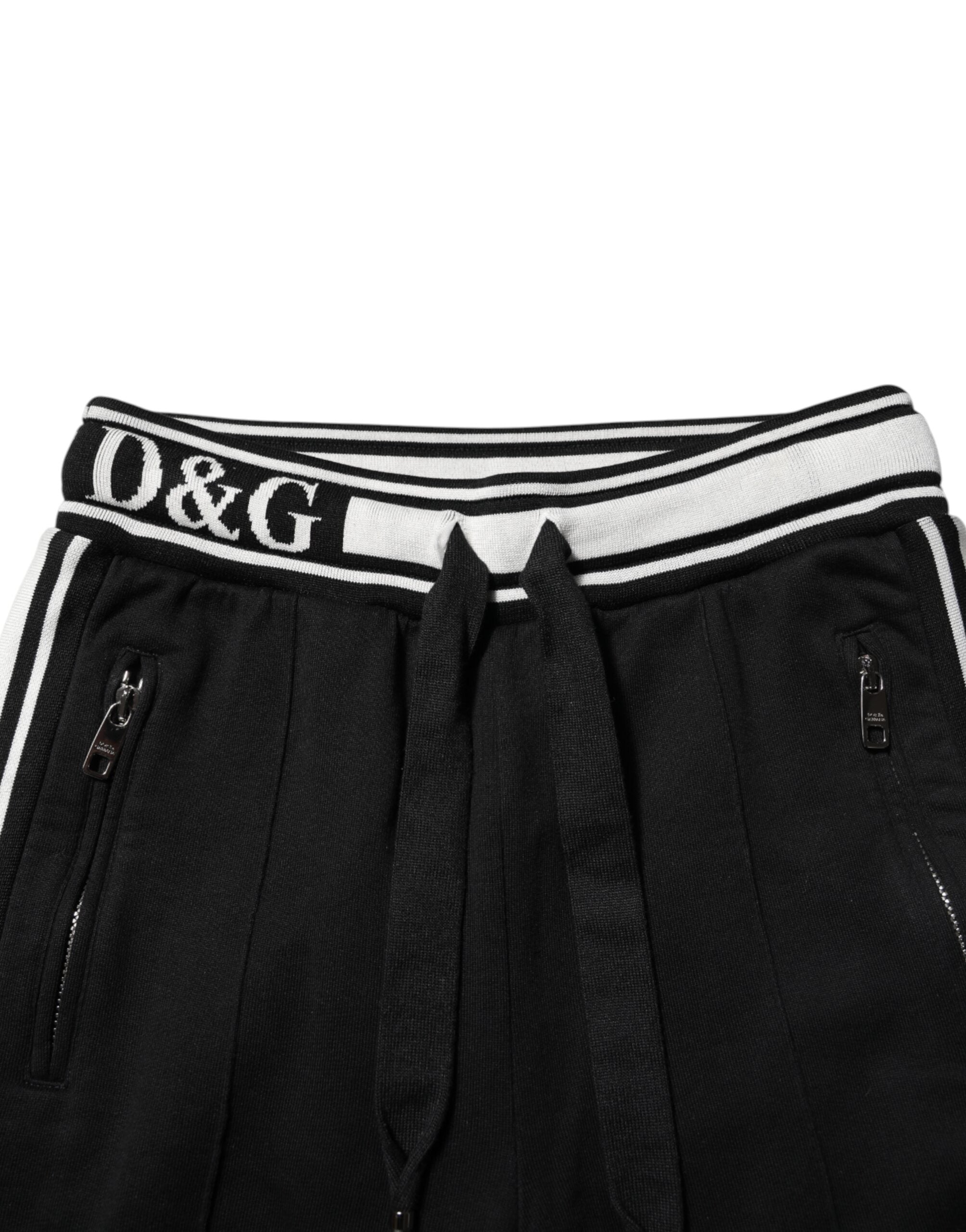 Pantalon jogging noir en coton Dolce & Gabbana avec logo à la taille, style décontracté et confortable.
