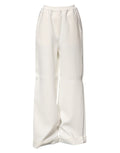 Pantalon large en viscose blanc Dolce & Gabbana à enfiler, coupe ample et élégante, vue de face sur fond neutre.