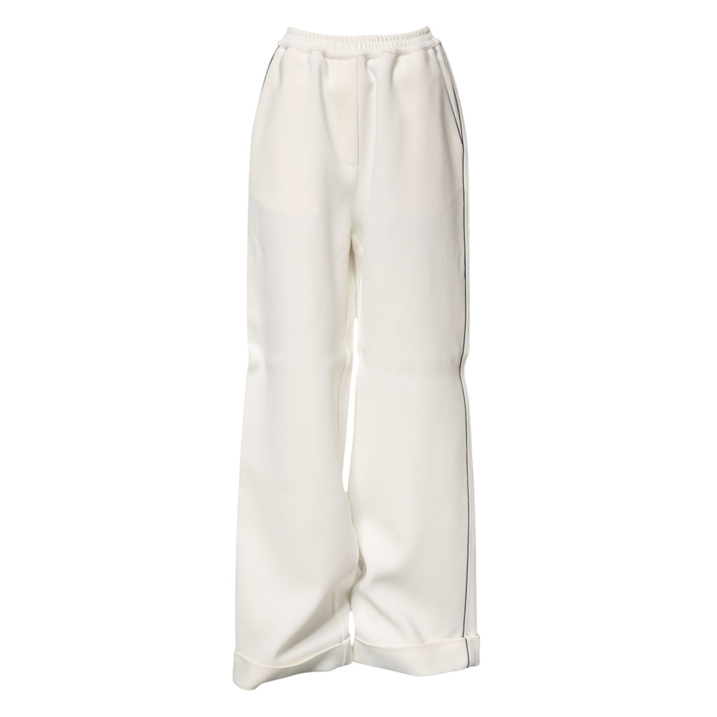 Pantalons blancs en viscose à jambes larges et à enfiler, de la marque Dolce & Gabbana, visibles sur l'image.