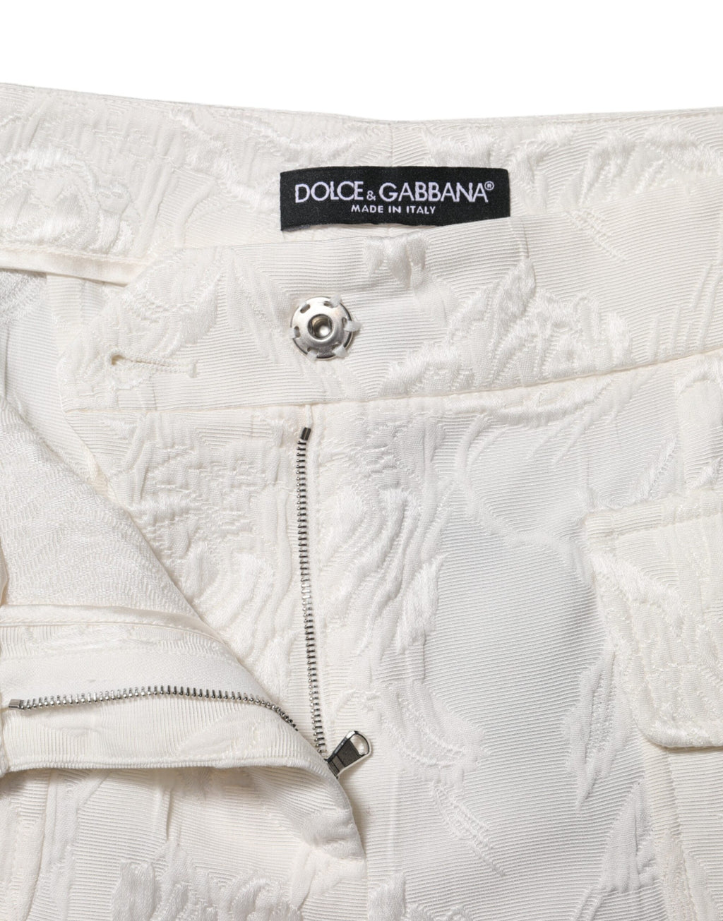 Pantalons en jacquard de coton blanc avec motif floral Dolce & Gabbana, style élégant et confortable.