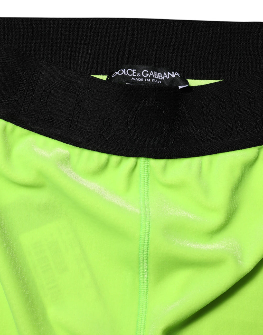 Leggings slim en nylon vert de Dolce & Gabbana, ajustés et modernes, visibles sur l'image.
