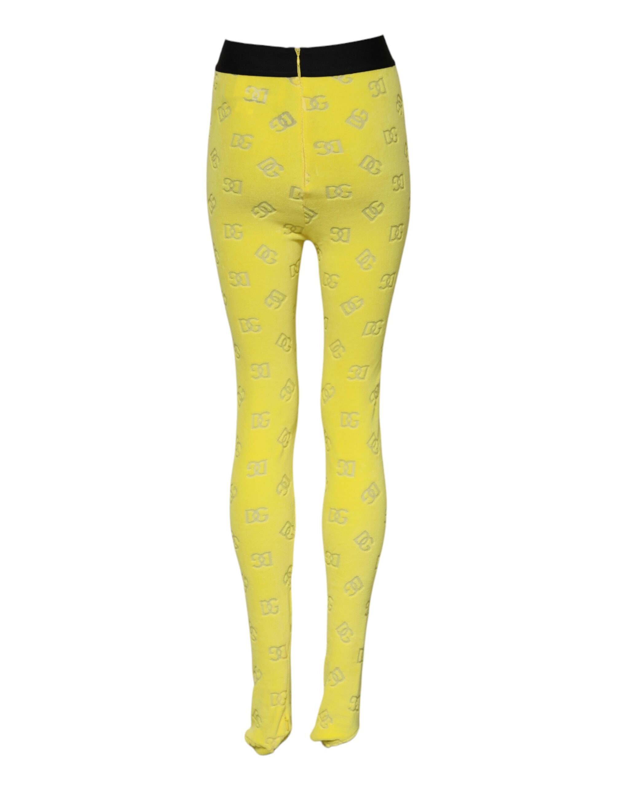 Leggings slim fit jaunes Dolce & Gabbana avec logo visible, en tissu extensible pour un style élégant et confortable.