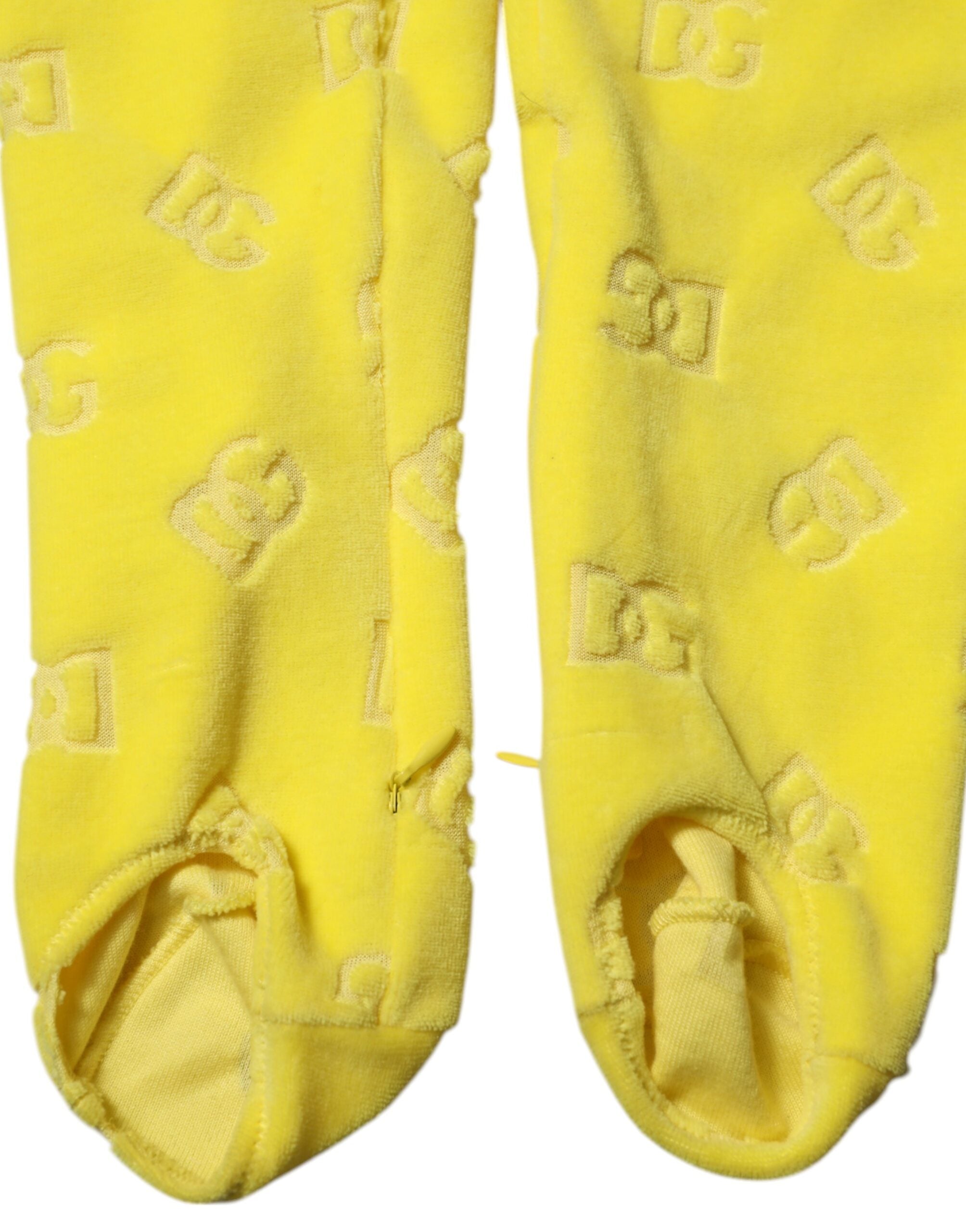 Leggings slim fit Dolce & Gabbana jaunes avec logo, en tissu extensible, vue de face.
