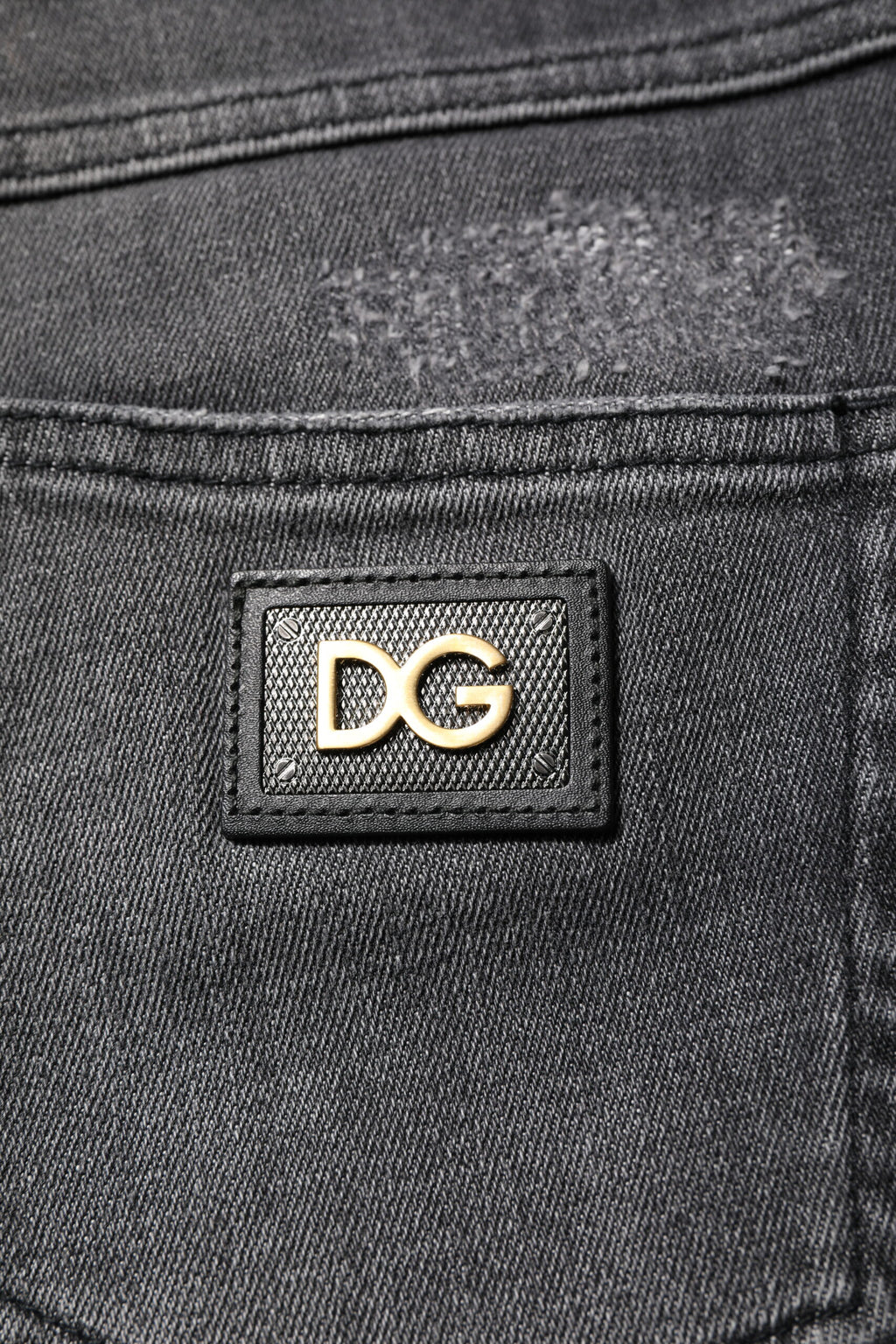 Jeans skinny en coton gris foncé Dolce & Gabbana Audrey, coupe ajustée et détails classiques visibles sur l'image.