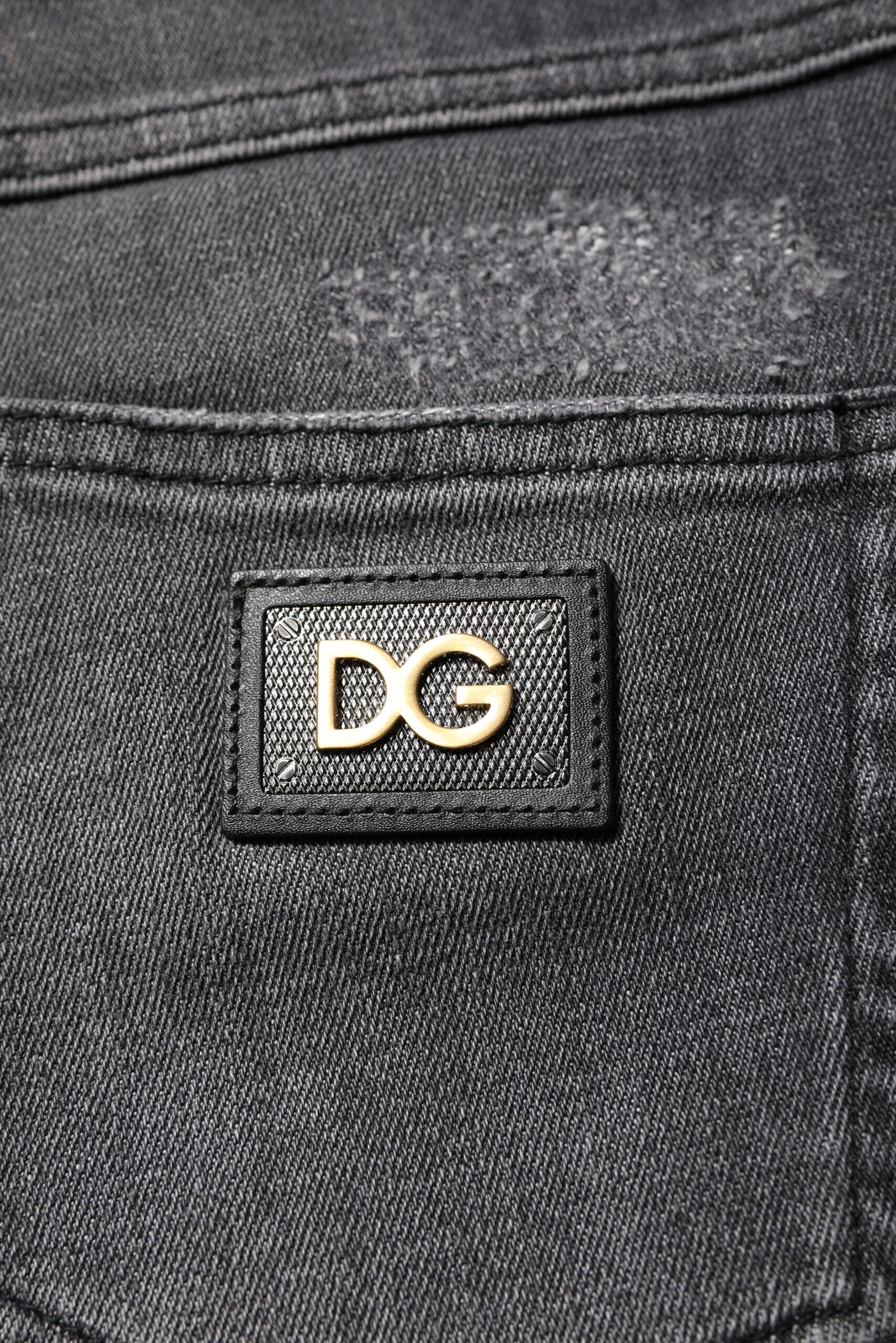 Jeans skinny en coton gris foncé Dolce & Gabbana Audrey, coupe ajustée et détails classiques visibles sur l'image.