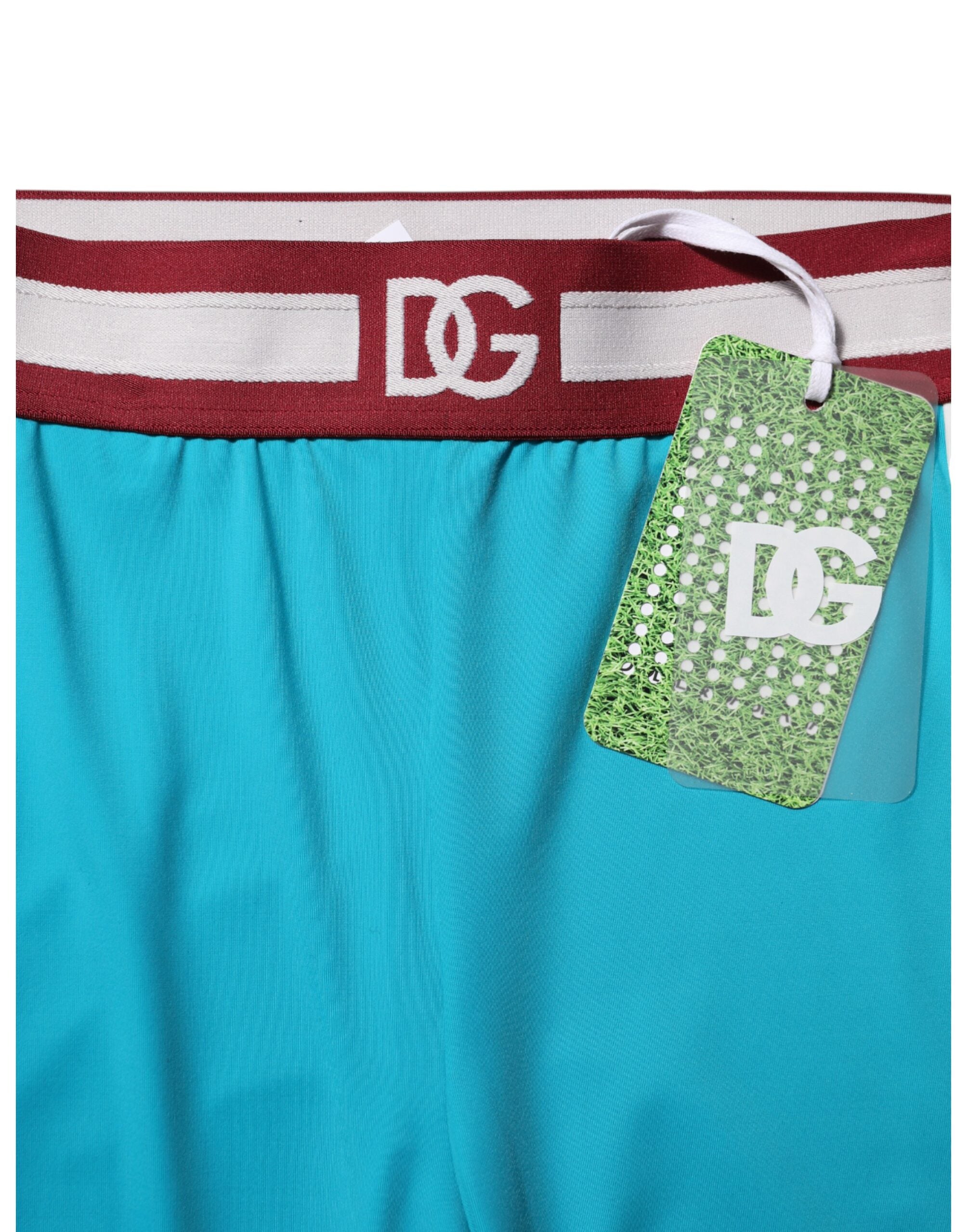 Leggings slim en nylon bleu de Dolce & Gabbana, coupe cropped et ajustée, visibles sur l'image.