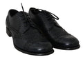 Dolce & Gabbana Oxfords aus dunkelblauem Leder mit Flügelkappe