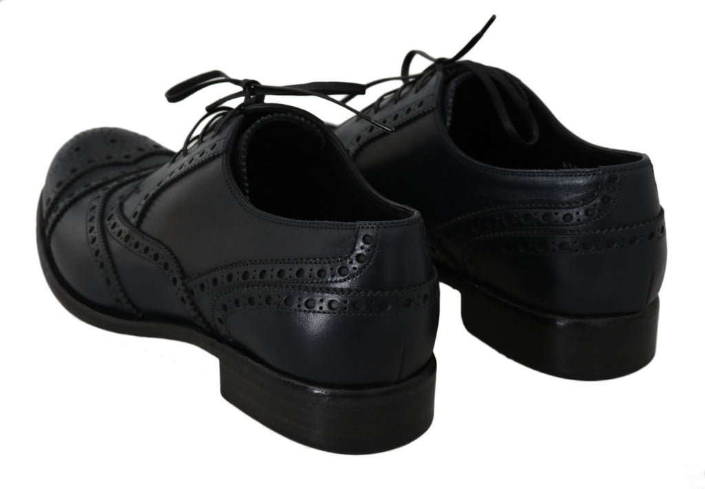 Dolce & Gabbana Oxfords aus dunkelblauem Leder mit Flügelkappe