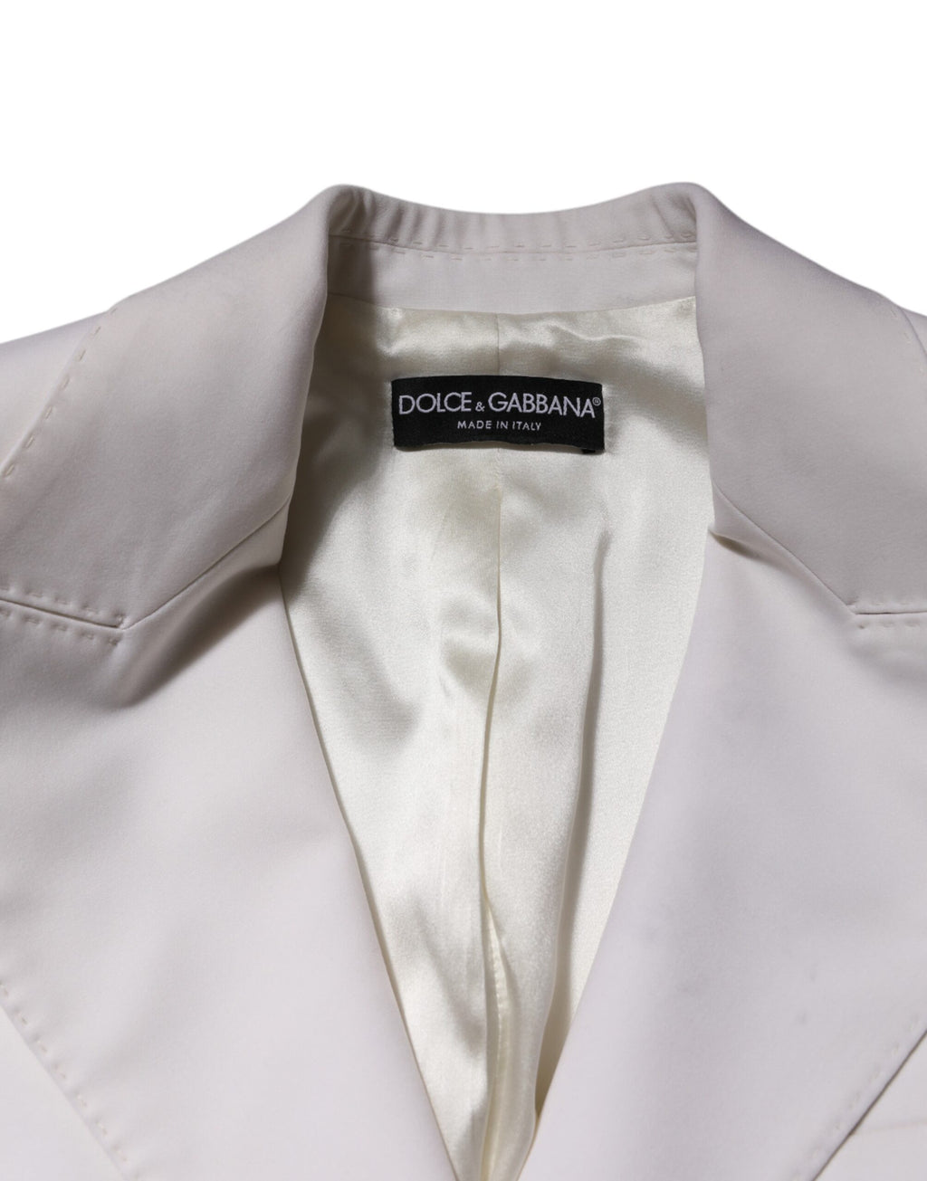 Manteau pour femmes en laine blanche Dolce & Gabbana, coupe croisée simple, détails élégants et finition soignée.