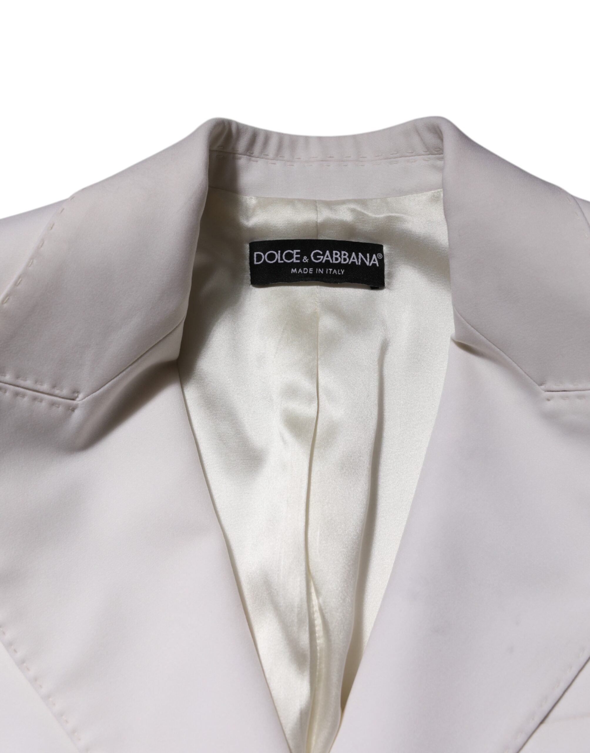 Manteau pour femmes en laine blanche Dolce & Gabbana, coupe croisée simple, détails élégants et finition soignée.