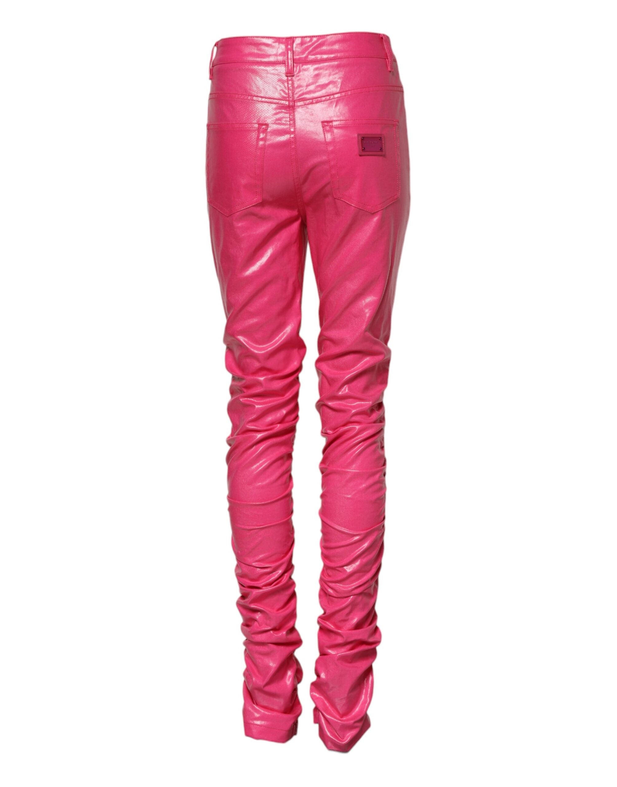 Jeans skinny en coton rose à taille haute de Dolce & Gabbana, coupe ajustée et style tendance, visible en image.