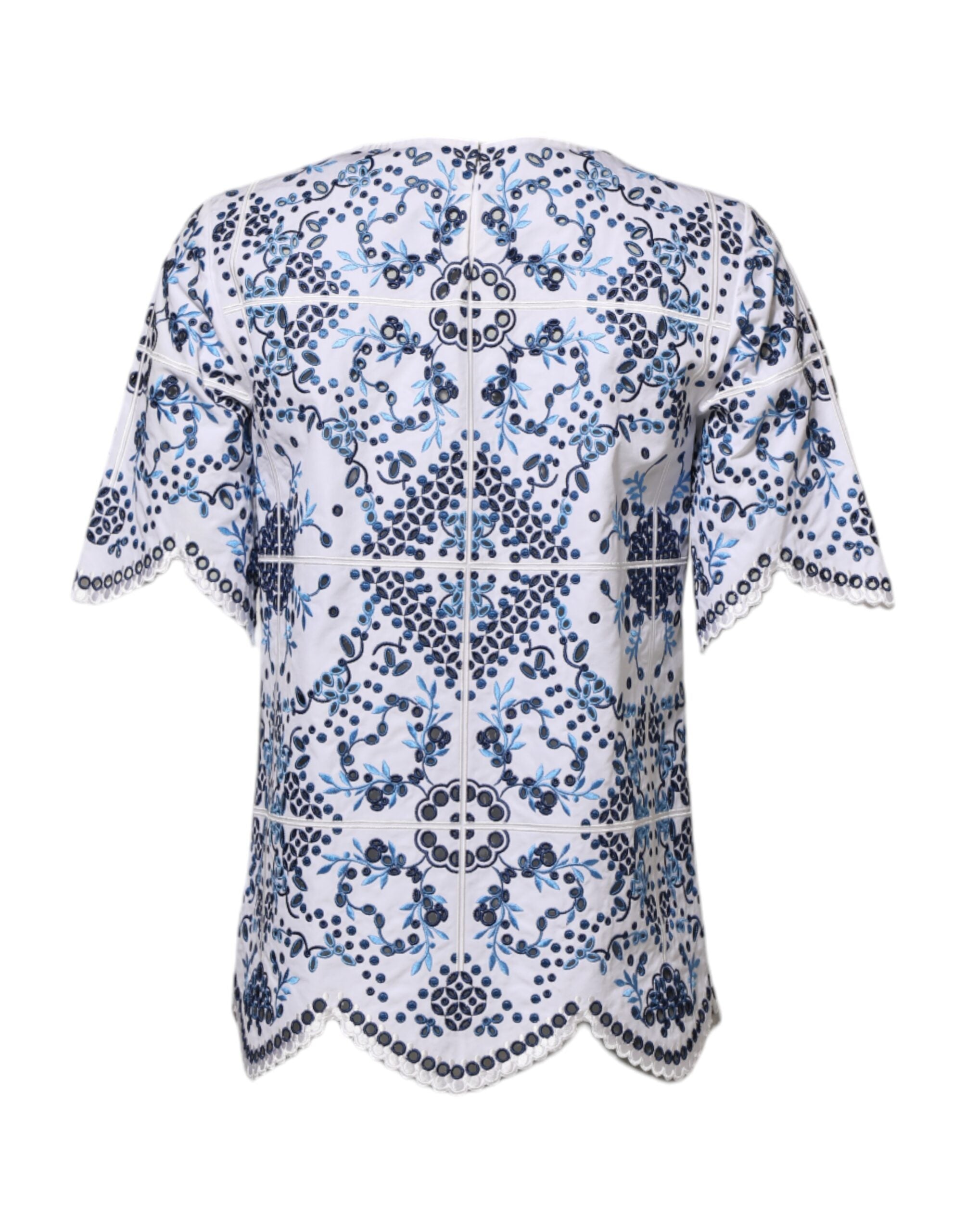 Blouse Dolce & Gabbana en dentelle bleue à col rond et œillets, élégante et féminine, vue de face.
