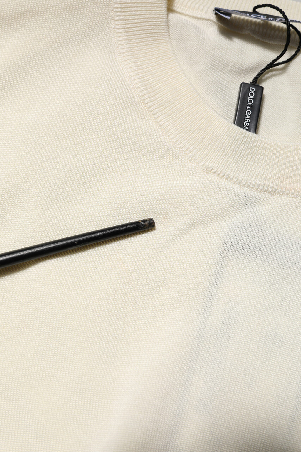 Chemise Dolce & Gabbana en soie blanche à manches courtes, haut élégant en tissu léger et fluide.