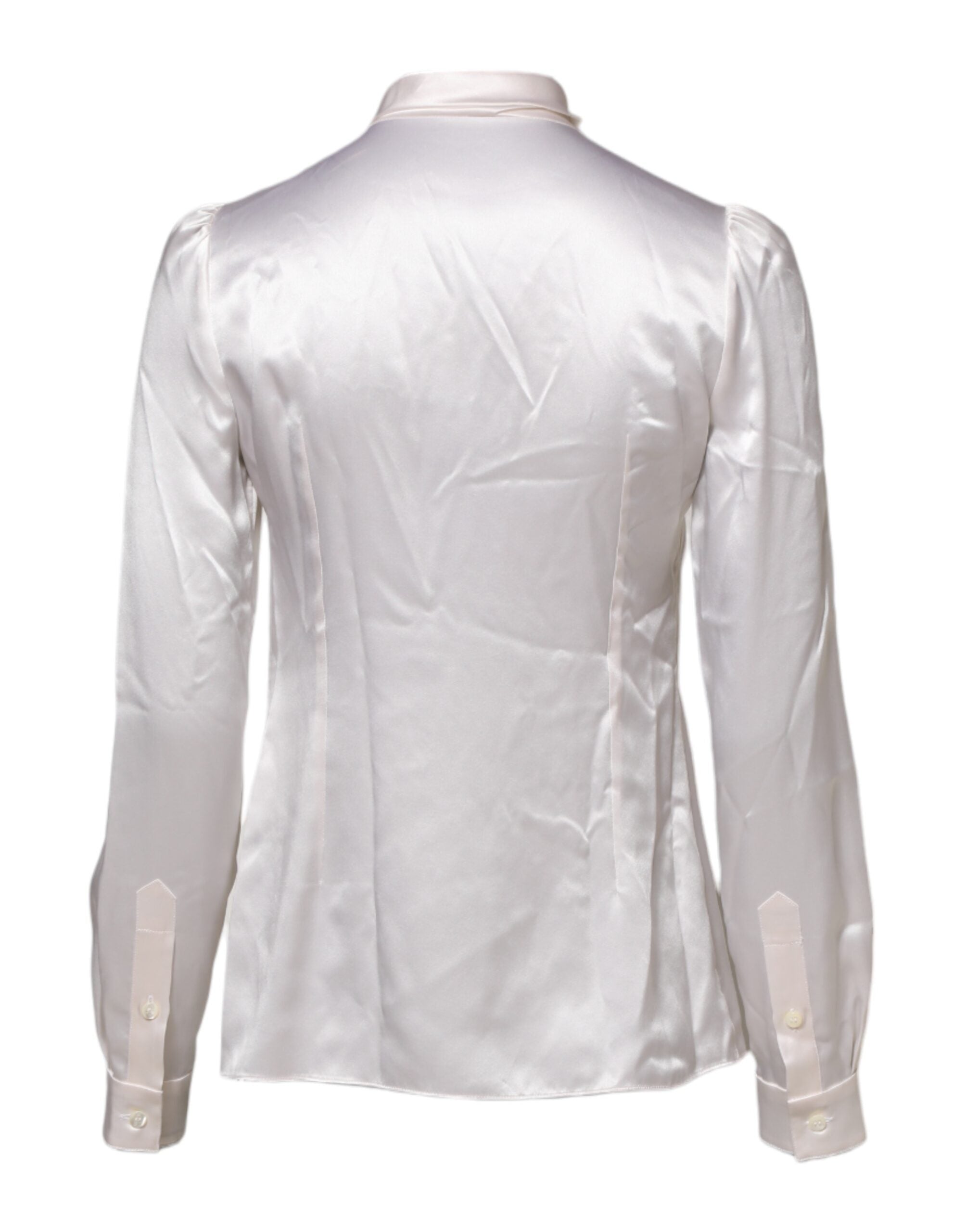 Blouse blanche Dolce & Gabbana à col ascot, manches longues, style élégant et sophistiqué en tissu léger.