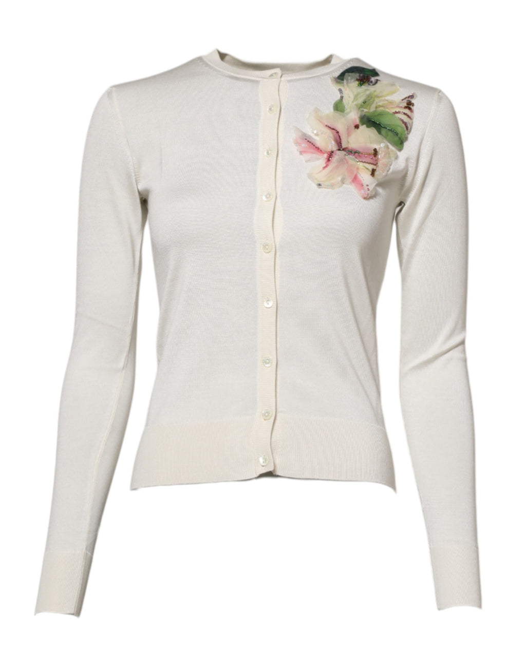 Cardigan en soie blanche Dolce & Gabbana avec embellissements de lys, manches longues et coupe élégante.