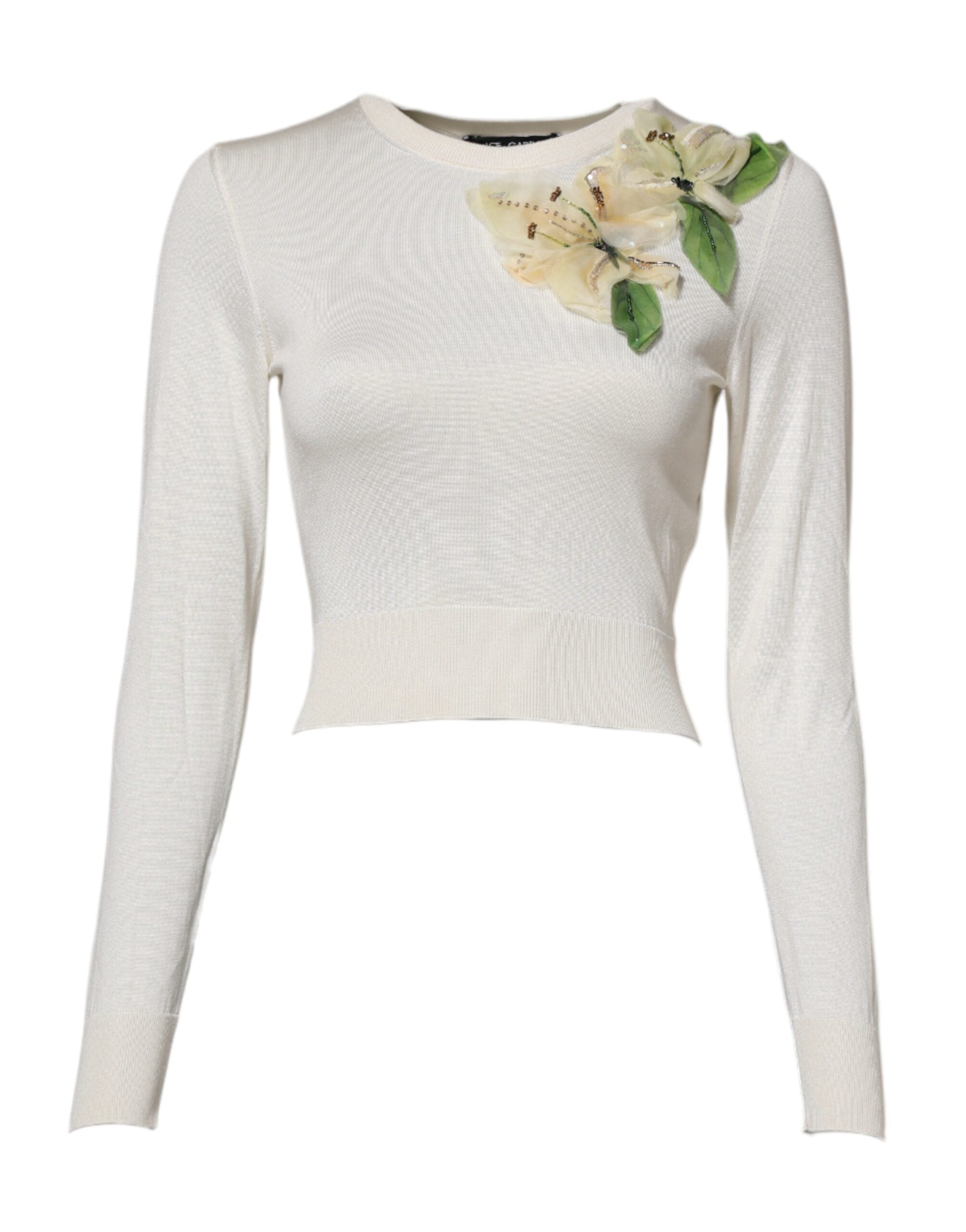 Pull-over en soie blanche Dolce & Gabbana orné de broderies de lys, élégant et sophistiqué.