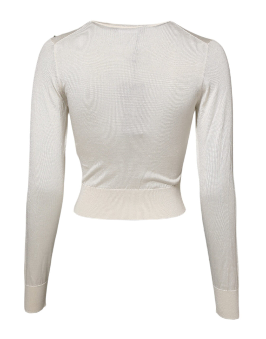 Pull en soie blanche Dolce & Gabbana avec embellissements de lys, doux et élégant, visible sur l'image.