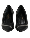 Chaussures Saint Laurent en cuir blanc et noir à talons aiguilles pointus, élégantes et mode, visibles en gros plan.