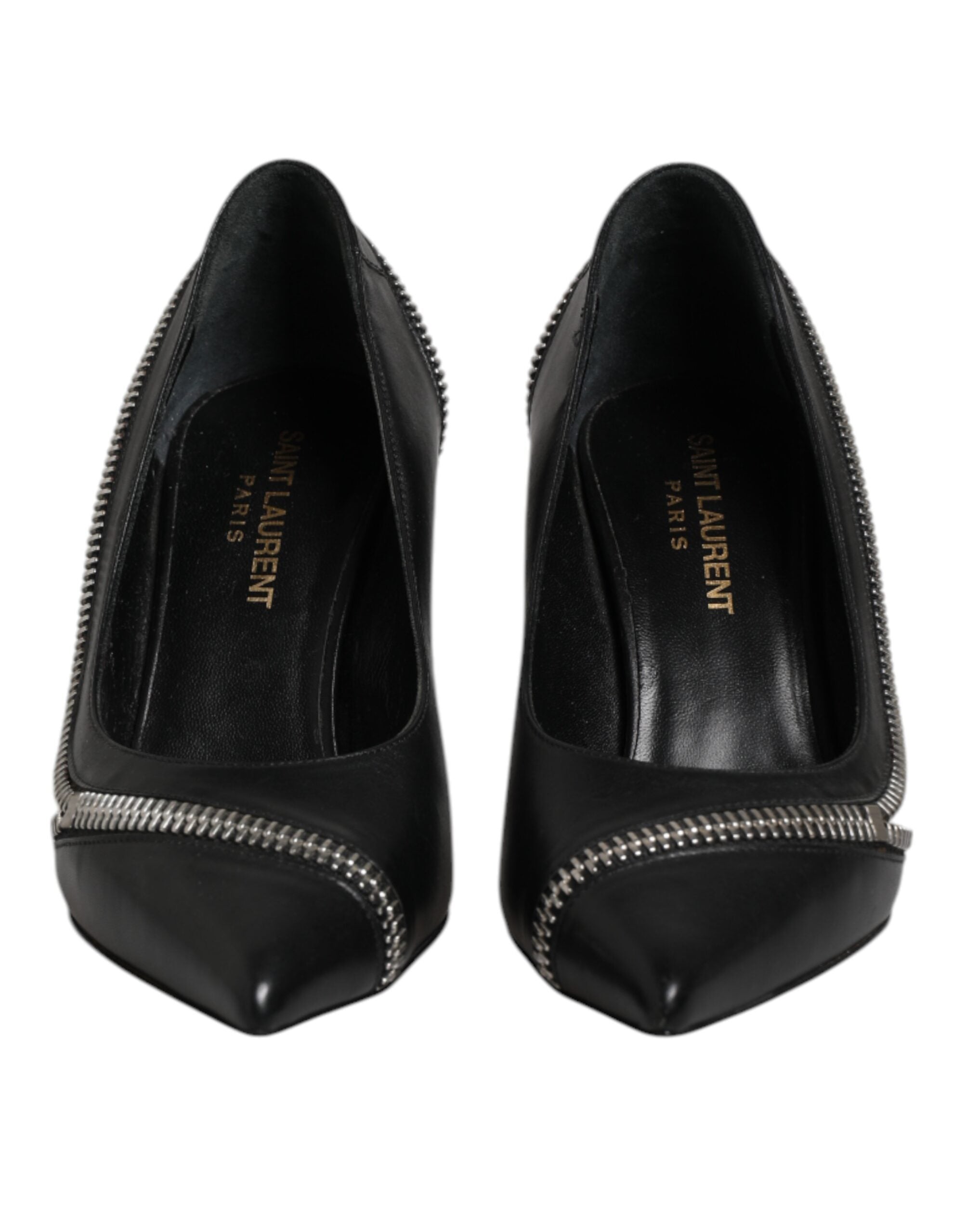 Chaussures Saint Laurent en cuir blanc et noir à talons aiguilles pointus, élégantes et mode, visibles en gros plan.