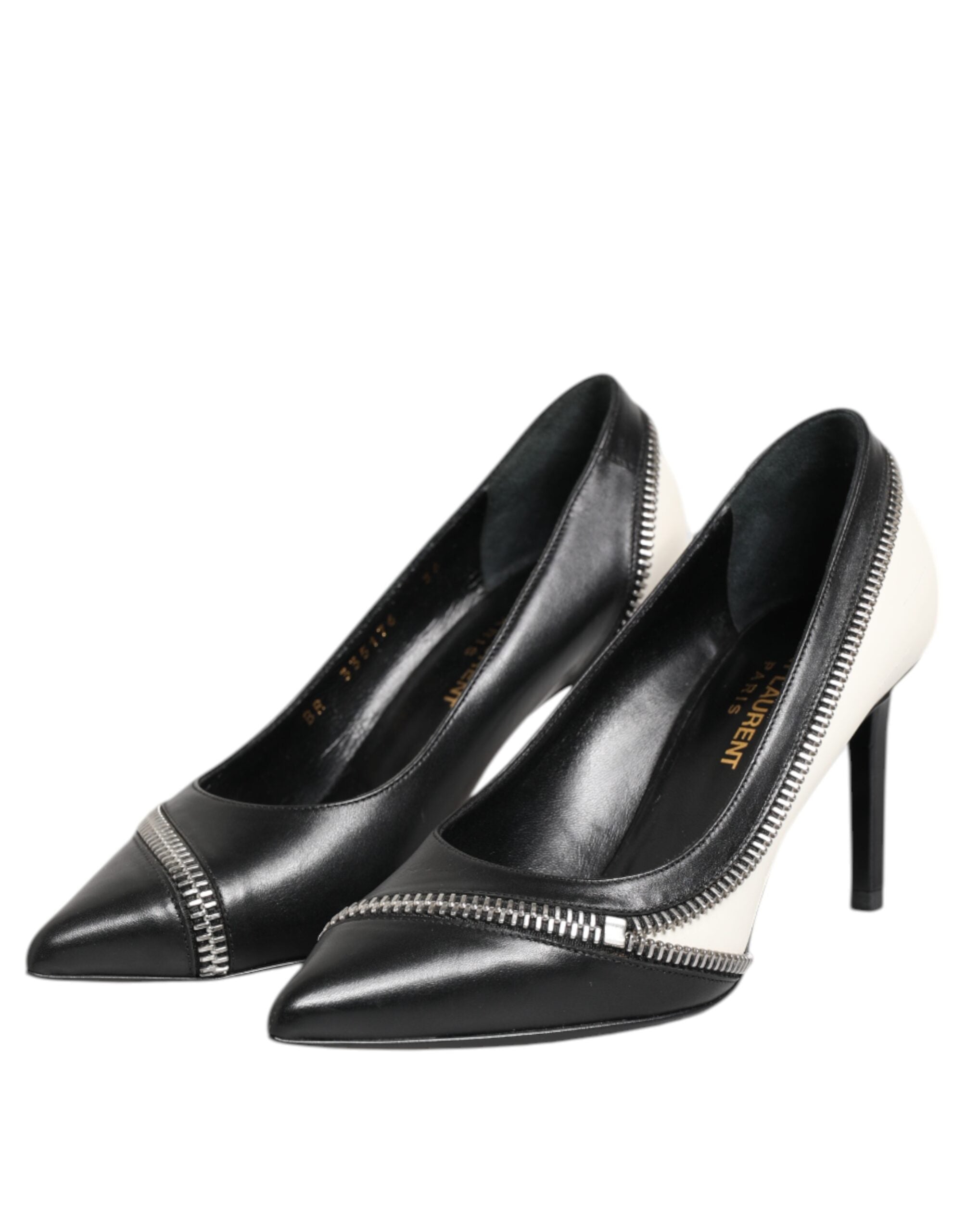 Chaussures Saint Laurent en cuir blanc et noir à talons aiguilles, pointes élégantes et sophistiquées.