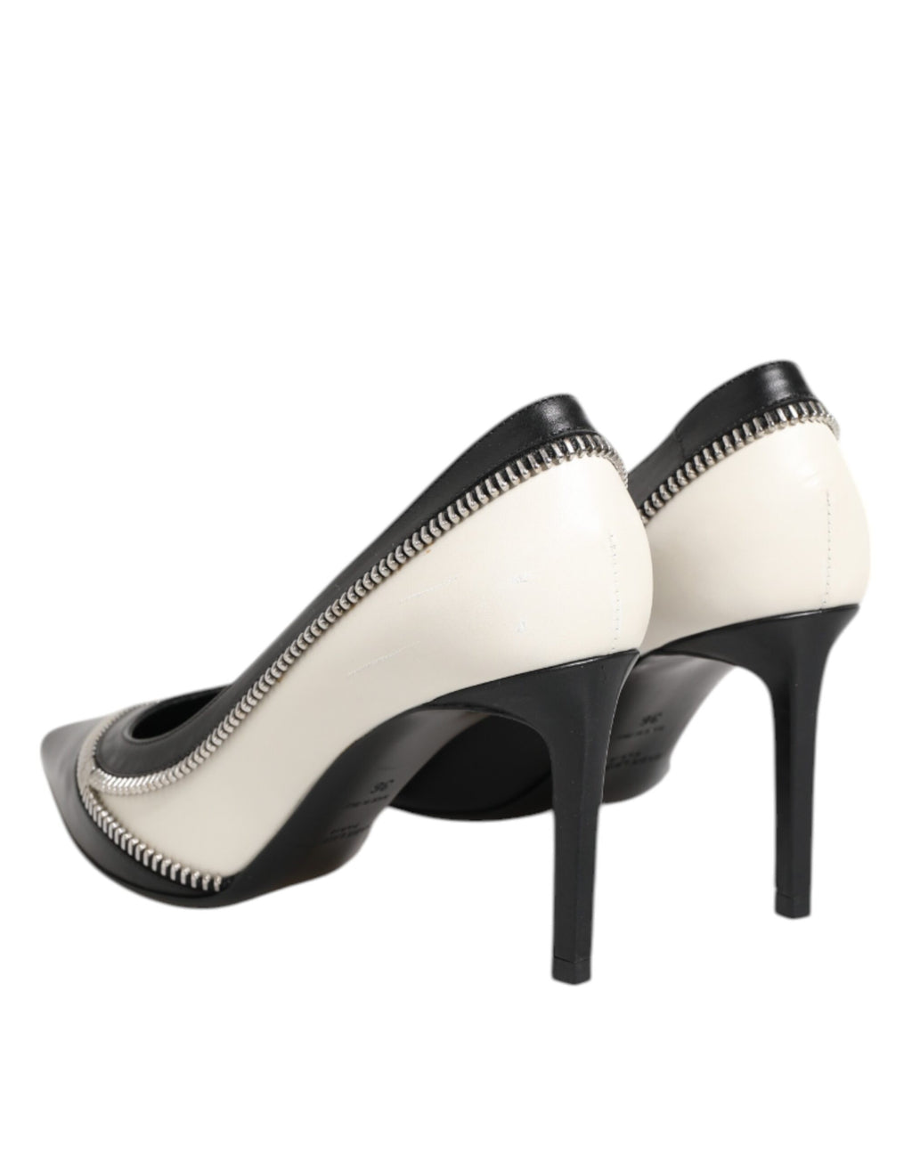Chaussures à talons Saint Laurent en cuir blanc et noir avec bout pointu, élégantes et sophistiquées.