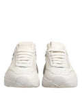 Sneakers blanches Dolce & Gabbana DAYMASTER en cuir de veau, vue de côté avec semelle blanche et design élégant.
