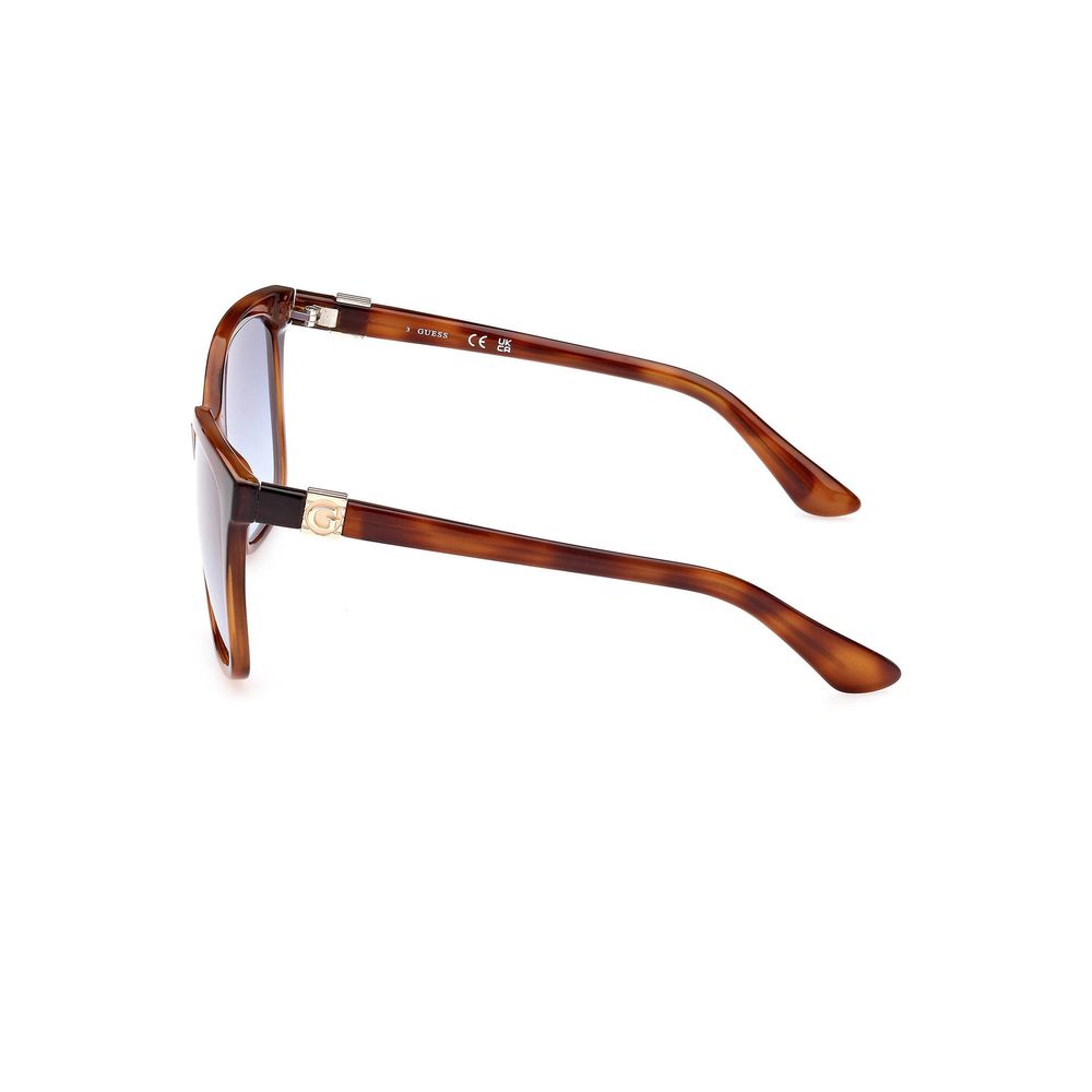 Lunettes de soleil pour femmes Guess Jeans marron injecté, monture tendance et design élégant, visibles en gros plan.