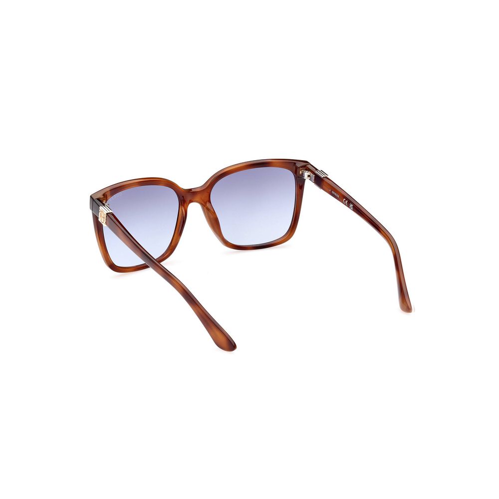 Lunettes de soleil marron injecté pour femmes Guess Jeans, design tendance avec monture élégante et verres protecteurs.