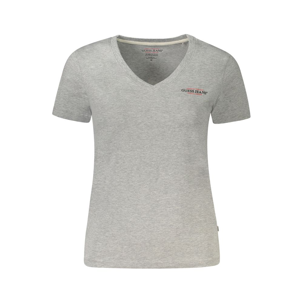 T-shirt pour femmes Guess Jeans gris en coton, coupe décontractée, logo Guess visible, porté sur mannequin.