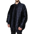 Veste bomber rembourrée blanche et bleue Dolce & Gabbana à fermeture éclair pleine longueur, style décontracté et élégant.