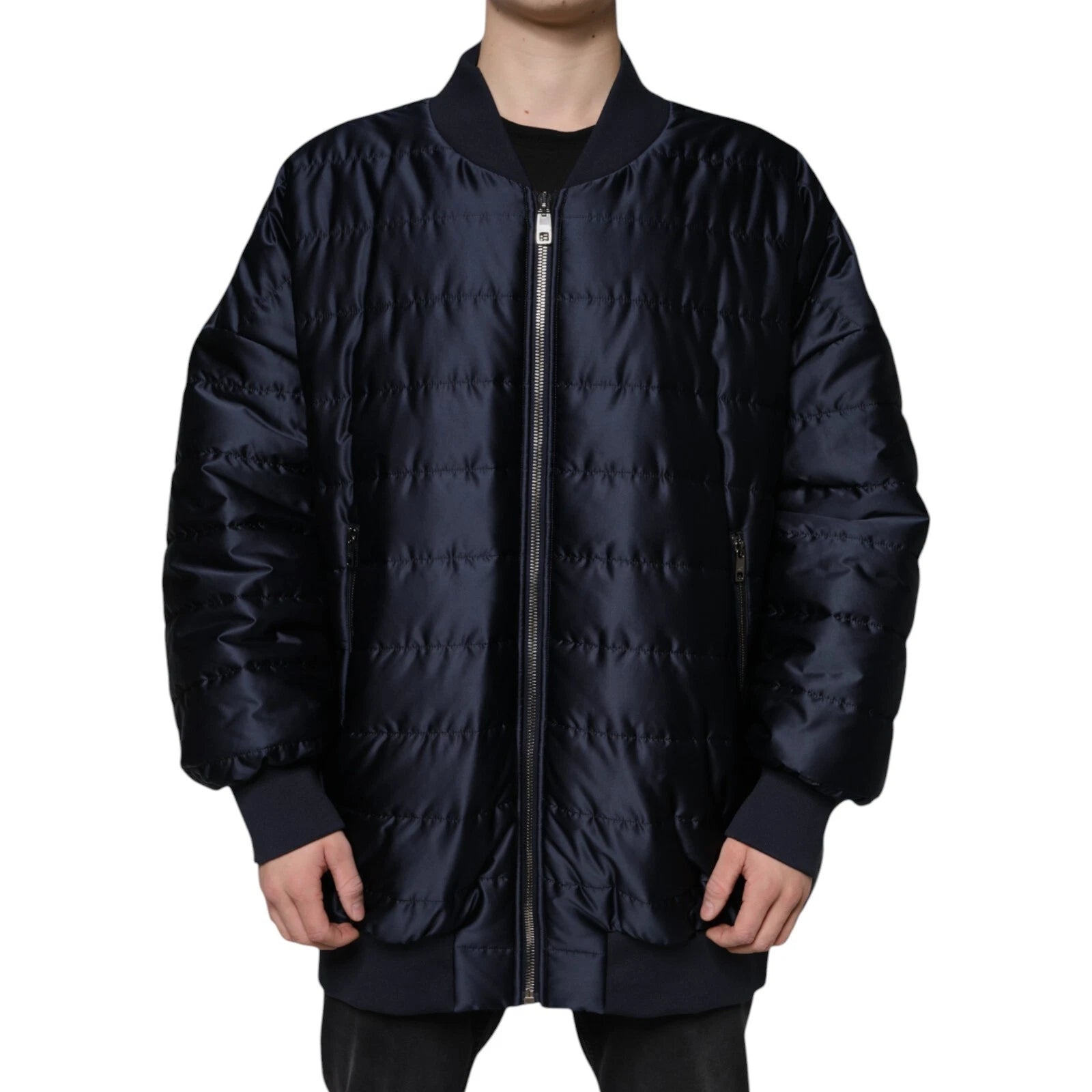 Veste bomber matelassée bleu foncé Dolce & Gabbana avec zip intégral, design élégant et détails sophistiqués.