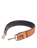 Sangle d'épaule pour sac en cuir exotique orange de Dolce & Gabbana, détail de la bandoulière en cuir de luxe.