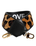 Sangle de sac réversible Dolce & Gabbana noire à imprimé léopard pour sac à épaule, en cuir élégant et tendance.