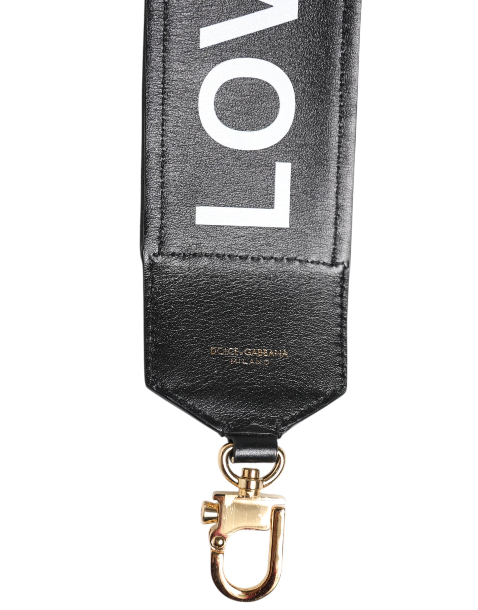 Sangle d'épaule réversible Dolce & Gabbana en cuir noir à imprimé léopard, pour sac à main élégant et polyvalent.